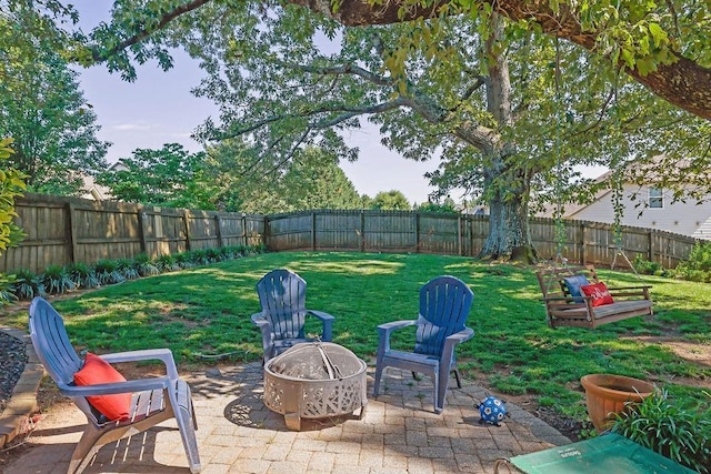 2295 Hemrick Rd, Cumming, GA 30041 - view of patio featuring an outdoor fire pit
