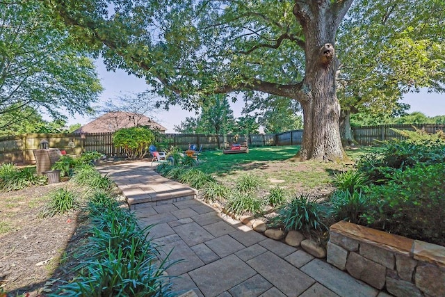 2295 Hemrick Rd, Cumming, GA 30041 - fenced backyard featuring a patio area