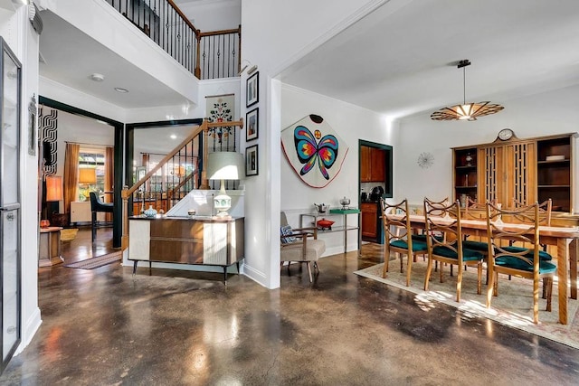 2295 Hemrick Rd, Cumming, GA 30041 - dining room featuring concrete flooring and stairway