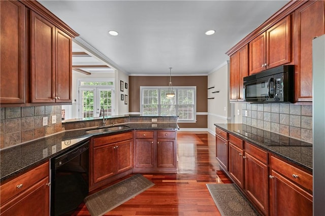 871 Windsor Creek Dr, Grayson, GA 30017 - kitchen with black appliances, dark wood-type flooring, a peninsula, french doors, and ornamental molding