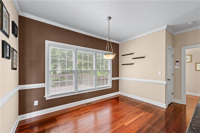 871 Windsor Creek Dr, Grayson, GA 30017 - unfurnished dining area with wood finished floors and crown molding