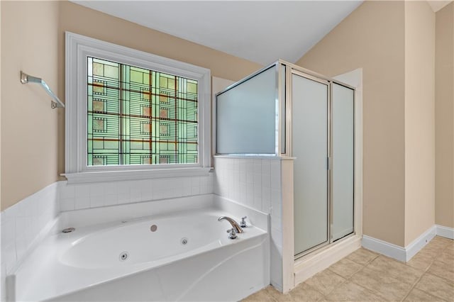 871 Windsor Creek Dr, Grayson, GA 30017 - bathroom with a shower stall, a whirlpool tub, and tile patterned floors