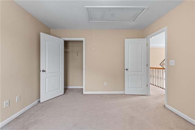 871 Windsor Creek Dr, Grayson, GA 30017 - unfurnished bedroom with attic access, carpet, and a closet