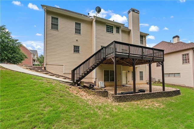 871 Windsor Creek Dr, Grayson, GA 30017 - rear view of property with a wooden deck, a lawn, stairs, and a chimney
