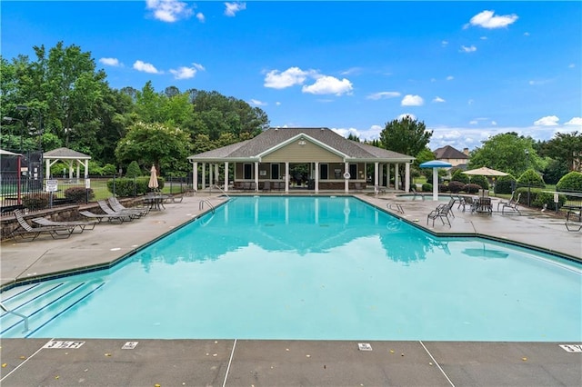 871 Windsor Creek Dr, Grayson, GA 30017 - community pool featuring a gazebo, a patio, and view of scattered trees