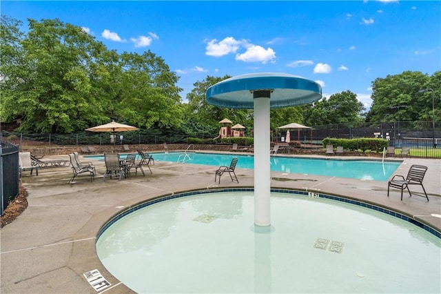 871 Windsor Creek Dr, Grayson, GA 30017 - community pool with view of scattered trees and a patio