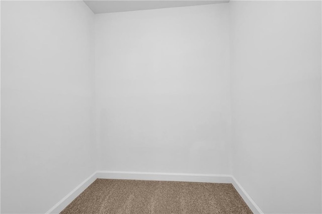 unfurnished room featuring carpet floors