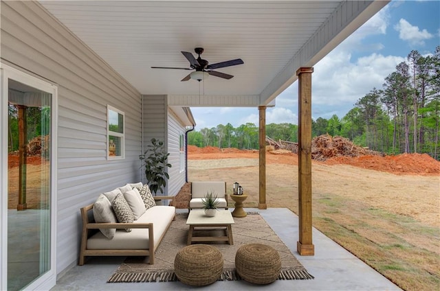 view of patio with outdoor lounge area and ceiling fan