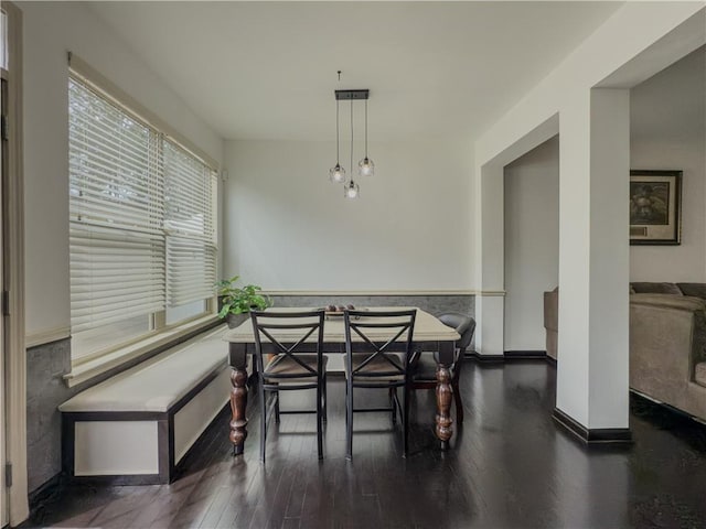 3318 Sardis Bend Dr, Buford, GA 30519 - dining space with wood finished floors and a wainscoted wall