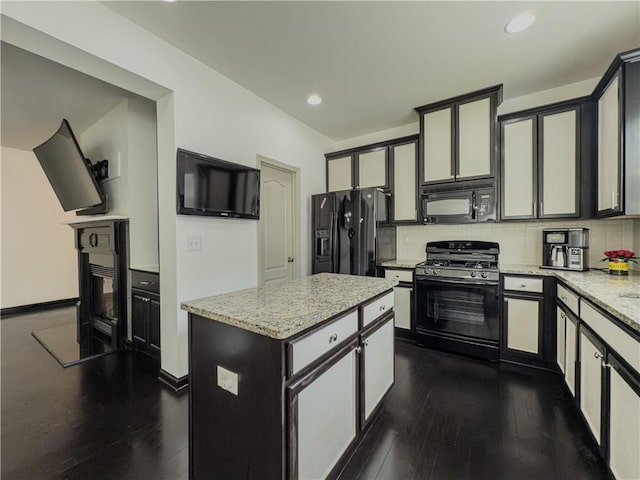 3318 Sardis Bend Dr, Buford, GA 30519 - kitchen featuring black appliances, backsplash, a center island, dark wood-type flooring, and recessed lighting