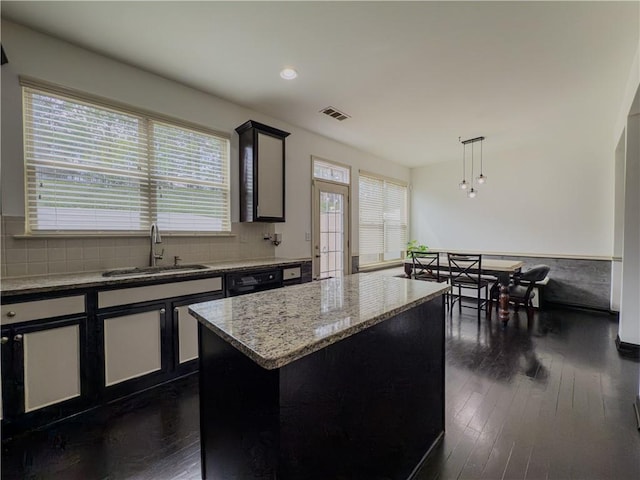 3318 Sardis Bend Dr, Buford, GA 30519 - kitchen featuring a sink, a center island, dark wood-type flooring, hanging light fixtures, and recessed lighting