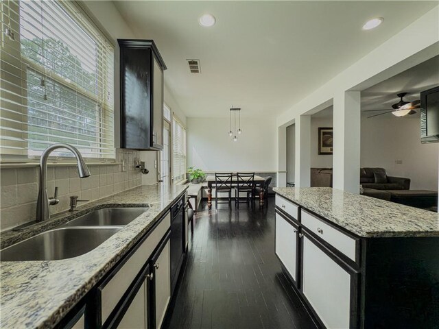 3318 Sardis Bend Dr, Buford, GA 30519 - kitchen featuring a sink, dishwasher, tasteful backsplash, pendant lighting, and a kitchen island