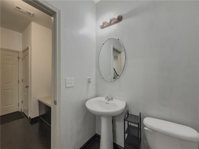 3318 Sardis Bend Dr, Buford, GA 30519 - half bath with toilet, a sink, and baseboards