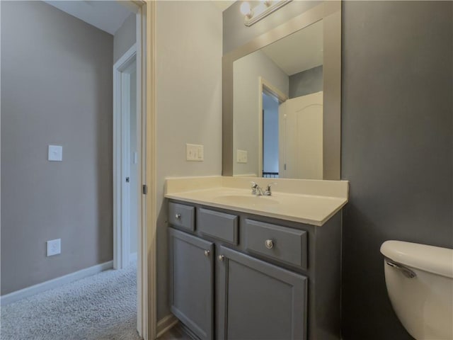 3318 Sardis Bend Dr, Buford, GA 30519 - bathroom featuring toilet, vanity, and baseboards