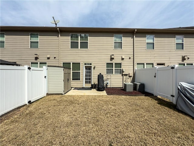 3318 Sardis Bend Dr, Buford, GA 30519 - back of house featuring a gate, a fenced backyard, and central air condition unit