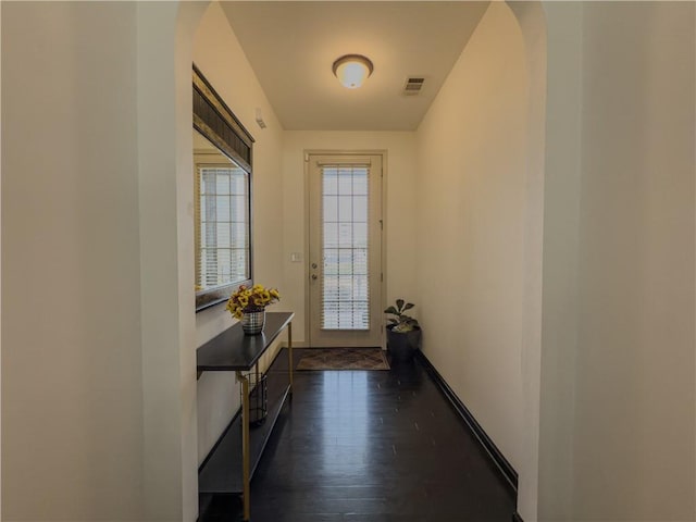 3318 Sardis Bend Dr, Buford, GA 30519 - entryway with baseboards, arched walkways, and dark wood-style flooring