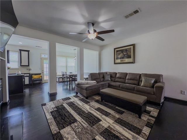 3318 Sardis Bend Dr, Buford, GA 30519 - living room featuring a ceiling fan, dark wood-style flooring, and baseboards