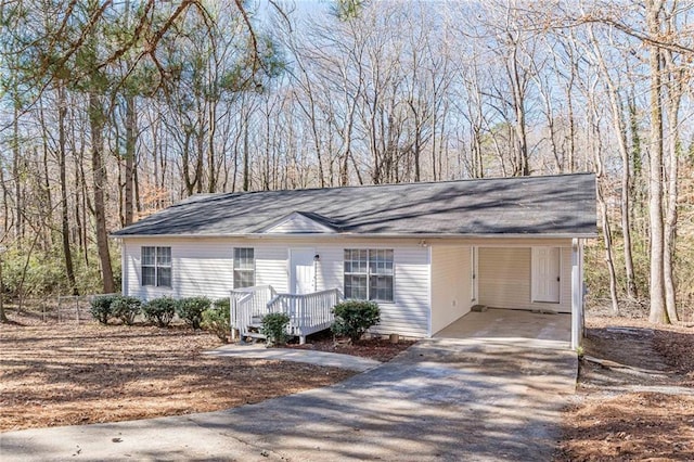 ranch-style house with a carport