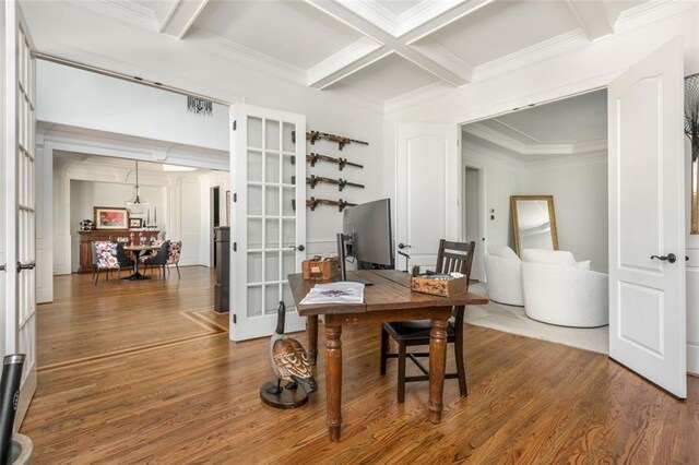 office with french doors, crown molding, beam ceiling, wood finished floors, and coffered ceiling