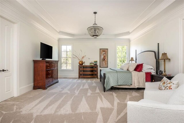 bedroom with crown molding, light colored carpet, and multiple windows