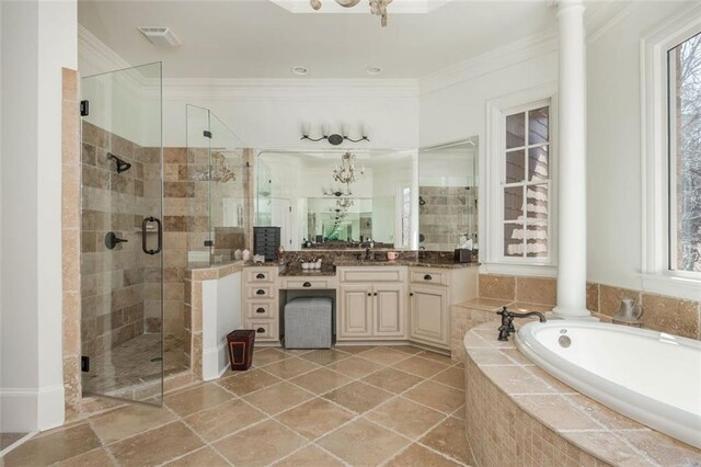 full bathroom featuring a garden tub, crown molding, a stall shower, and vanity