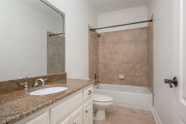 bathroom featuring shower / tub combination, tile patterned flooring, vanity, toilet, and ornamental molding