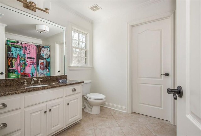 bathroom with crown molding, visible vents, toilet, and vanity