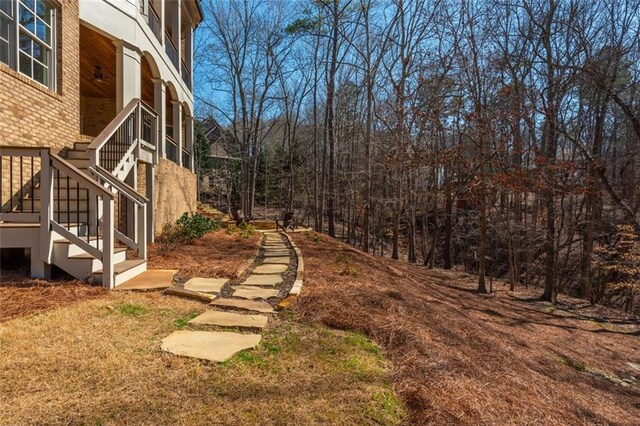 view of yard featuring stairs