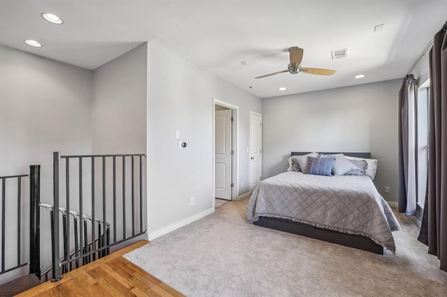 bedroom featuring wood-type flooring and ceiling fan