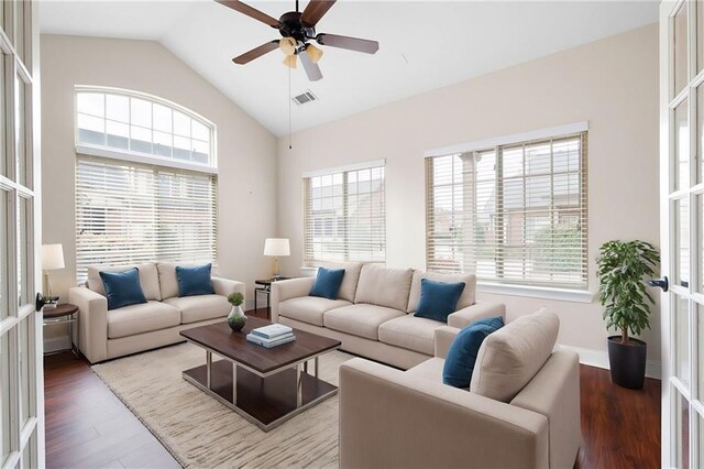 120 Chastain Rd NW Unit 1204, Kennesaw, GA 30144 - living room featuring high vaulted ceiling, visible vents, baseboards, wood finished floors, and a ceiling fan