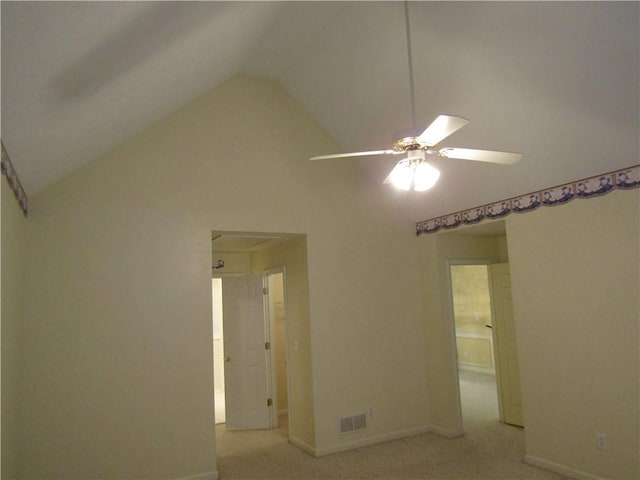 5820 Elm Tree Dr, Buford, GA 30518 - empty room featuring vaulted ceiling, carpet floors, a ceiling fan, and attic access