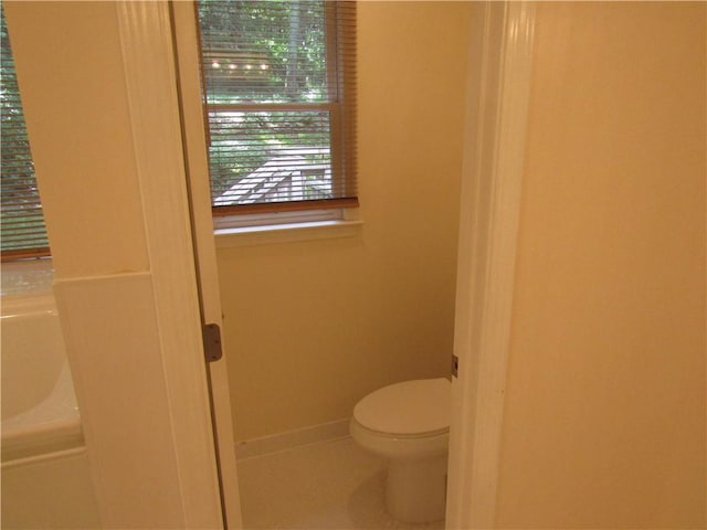 5820 Elm Tree Dr, Buford, GA 30518 - bathroom featuring tile patterned flooring and a bathtub