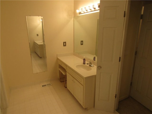 5820 Elm Tree Dr, Buford, GA 30518 - bathroom with vanity and tile patterned flooring