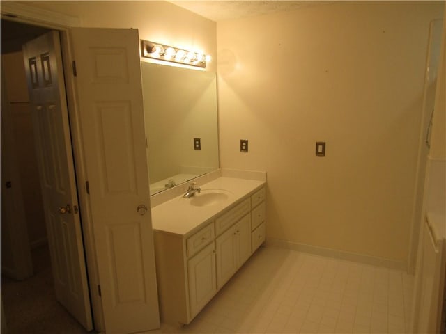 5820 Elm Tree Dr, Buford, GA 30518 - bathroom featuring vanity and tile patterned floors