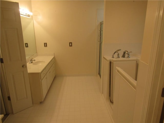 5820 Elm Tree Dr, Buford, GA 30518 - bathroom with vanity, a shower stall, a bath, and tile patterned flooring