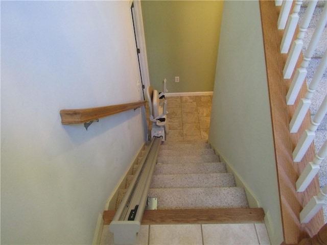 5820 Elm Tree Dr, Buford, GA 30518 - stairway featuring tile patterned floors and baseboards