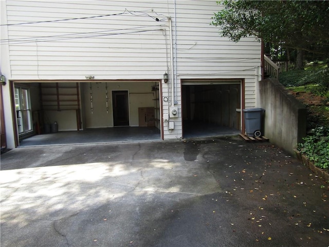 5820 Elm Tree Dr, Buford, GA 30518 - garage with asphalt driveway