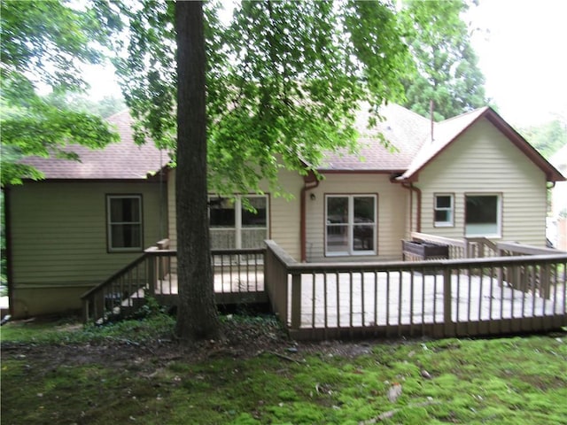 5820 Elm Tree Dr, Buford, GA 30518 - rear view of house featuring roof with shingles and a deck