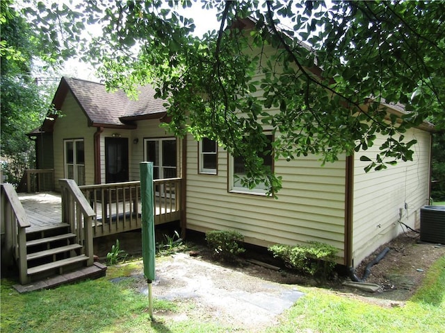 5820 Elm Tree Dr, Buford, GA 30518 - back of house with a deck and roof with shingles