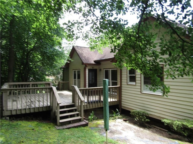 5820 Elm Tree Dr, Buford, GA 30518 - rear view of house featuring a wooden deck and roof with shingles