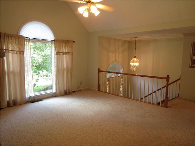 5820 Elm Tree Dr, Buford, GA 30518 - carpeted spare room with plenty of natural light, a chandelier, ceiling fan, and vaulted ceiling