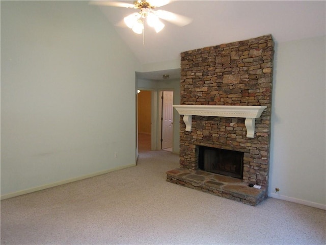 5820 Elm Tree Dr, Buford, GA 30518 - unfurnished living room featuring ceiling fan, a stone fireplace, carpet, and lofted ceiling