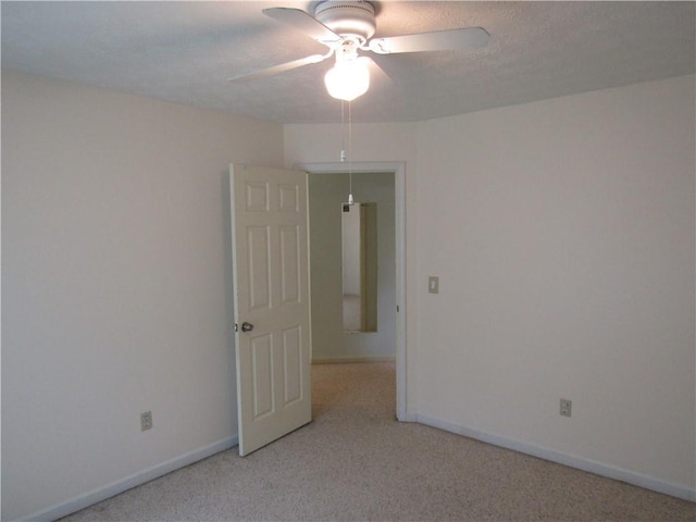 5820 Elm Tree Dr, Buford, GA 30518 - spare room with ceiling fan and light carpet