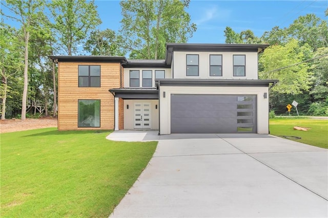 2808 S Arbor Dr, Gainesville, GA 30507 - modern home with driveway, an attached garage, a front lawn, and stucco siding