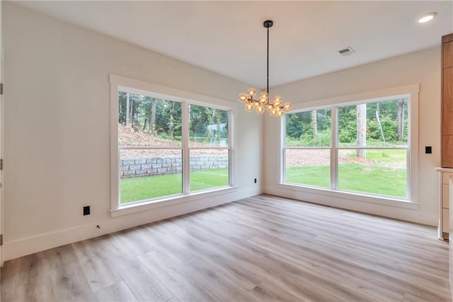 2808 S Arbor Dr, Gainesville, GA 30507 - unfurnished dining area featuring plenty of natural light, light wood-style floors, a chandelier, baseboards, and recessed lighting