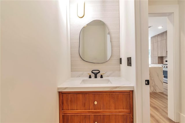 2808 S Arbor Dr, Gainesville, GA 30507 - bathroom featuring vanity and wood finished floors