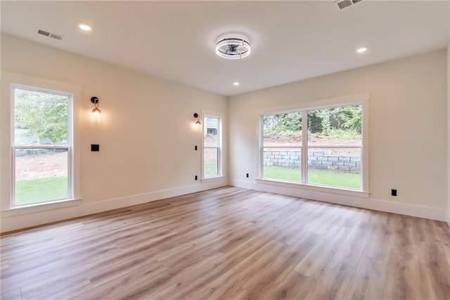 2808 S Arbor Dr, Gainesville, GA 30507 - empty room with light wood-style floors, plenty of natural light, baseboards, and recessed lighting