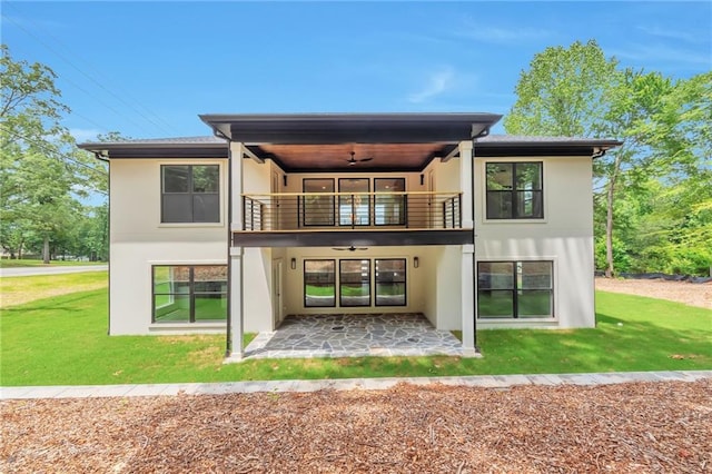 2808 S Arbor Dr, Gainesville, GA 30507 - rear view of property featuring a balcony, stucco siding, a yard, and a patio area