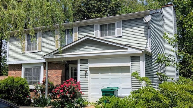 4256 Village Square Ln, Stone Mountain, GA 30083 - view of front facade with a chimney and brick siding