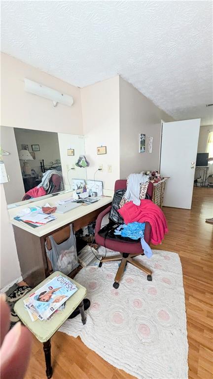 4256 Village Square Ln, Stone Mountain, GA 30083 - office space with light wood-type flooring and a textured ceiling